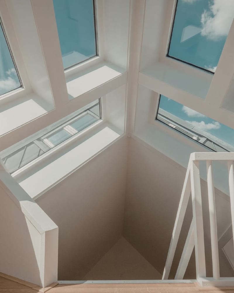 Bright interior with clean skylights and roof windows letting in natural light
